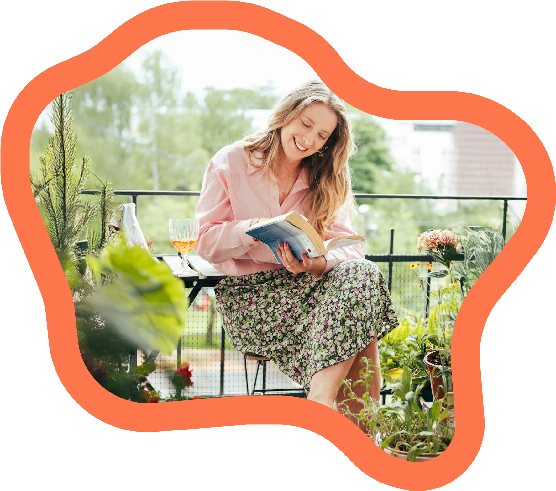 Photo of Mateja working on the balcony